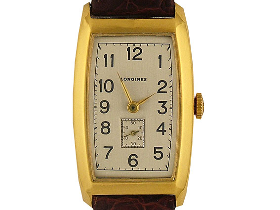 Longines Curvex Vintage Handaufzug Gelbgold 35x24mm Archive